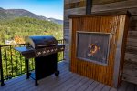 Enjoy the gas grill and fireplace on the deck